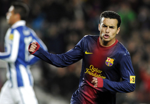 Barcelona's Pedro celebrates a goal against Espanyol during their Spanish First division soccer league match at Camp Nou stadium in Barcelona