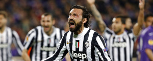 Juventus' Pirlo celebrates after scoring against Fiorentina during their Europa League round of 16 second leg soccer match in Florence