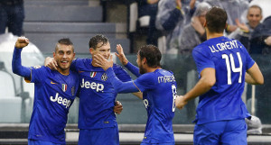 Juventus' Lichtsteiner celebrates with teammates after scoring against Parma during their Italian Serie A soccer match in Turin