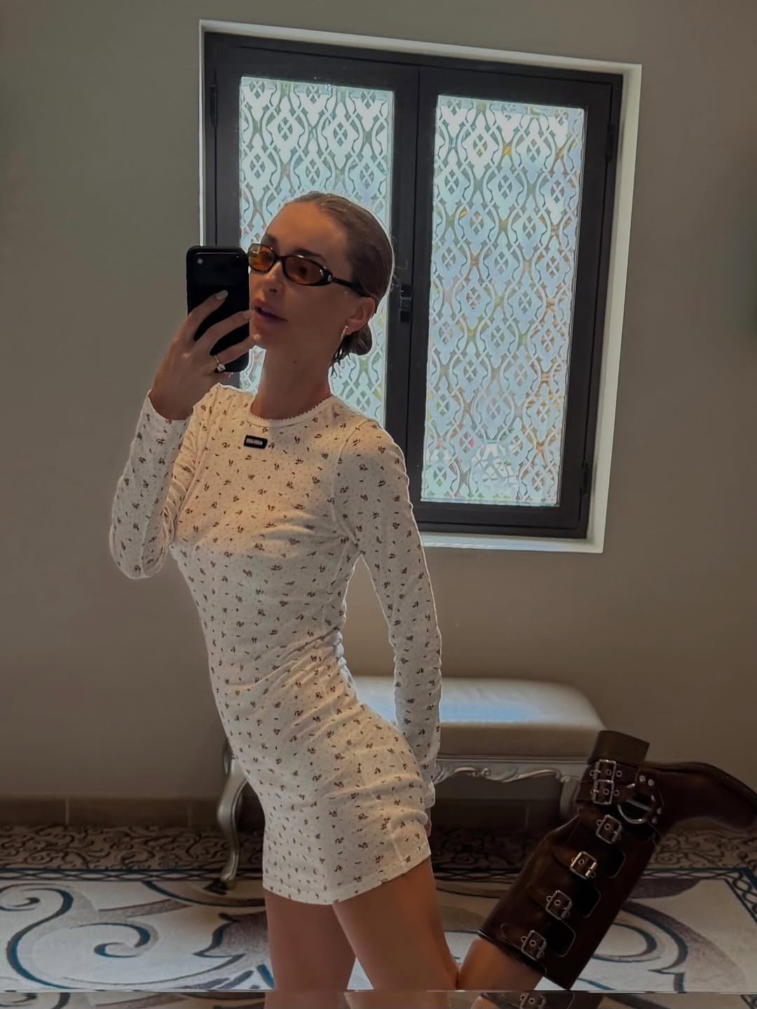 Photo by Pernille Teisbaek on February 15, 2026. May be a selfie of turtleneck, dress, fishnet stockings and text.